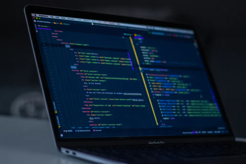 Laptop showing application code